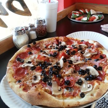 The Original Brooklyn Pie - Hell yeah...the #4, with a caprese salad in the corner!! - Pizza Near Me - Round Rock, Texas The Original Brooklyn Pie - Hell yeah...the #4, with a caprese salad in the corner!! - Pizza Near Me - Round Rock, Texas