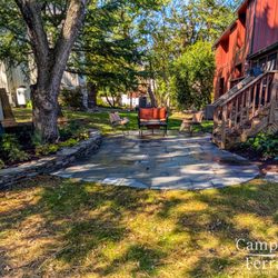 Campbell & Ferrara - Geo-Cut Flagstone Patio with Stacked Stone Retaining Wall