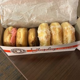 1/2 dozen which includes strawberry frosted, maple frosted, chocolate frosted and glaze.
