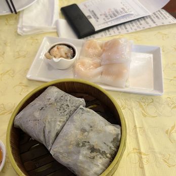 Koi Palace - Sticky Rice Wrapped by Lotus Leaf and Shrimp Rice Crepe Roll - Dim Sum Near Me - Milpitas, California Koi Palace - Sticky Rice Wrapped by Lotus Leaf and Shrimp Rice Crepe Roll - Dim Sum Near Me - Milpitas, California