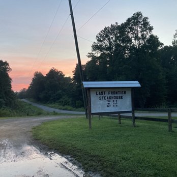 Last Frontier - Signage with operating hours - Steakhouses Near Me - Carbon Hill, Alabama