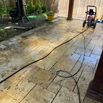 Robinson Home Construction - a pressurer on a patio - Handyman Near Me
