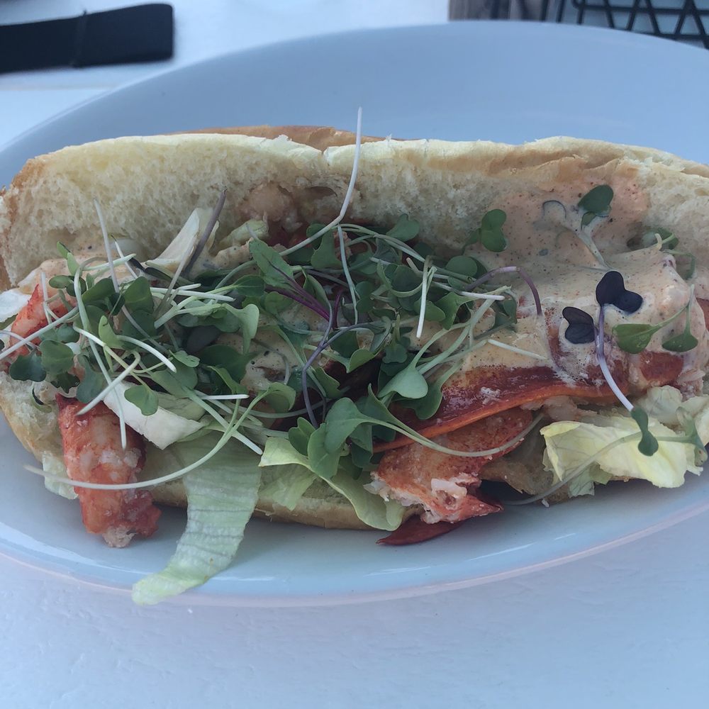 Sand House Kitchen - Lobster roll outstanding!! comes with chips but side of Old Bay waffle fries were delish and huge!! - New American Near Me - Ocean City, New Jersey Sand House Kitchen - Lobster roll outstanding!! comes with chips but side of Old Bay waffle fries were delish and huge!! - New American Near Me - Ocean City, New Jersey
