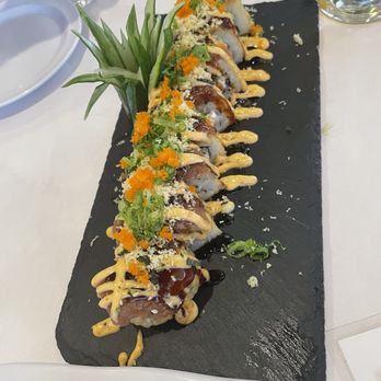 Honey Bee Asian Bistro - The artistic talent is amazing on these sushi rolls! Cowboy Roll (Deep fried) - Chinese Near Me - Aurora, Colorado