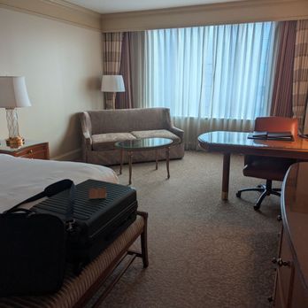 Conrad Indianapolis - Desk with office chair, couch, sofa table, outlets at the desk - Hotels Near Me - Indianapolis, Indiana Conrad Indianapolis - Desk with office chair, couch, sofa table, outlets at the desk - Hotels Near Me - Indianapolis, Indiana