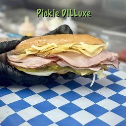 Bussin’ Subs Food Truck - Literally dill pickle from top to bottom. Including a homemade dill pickle butter spread on the top bun.