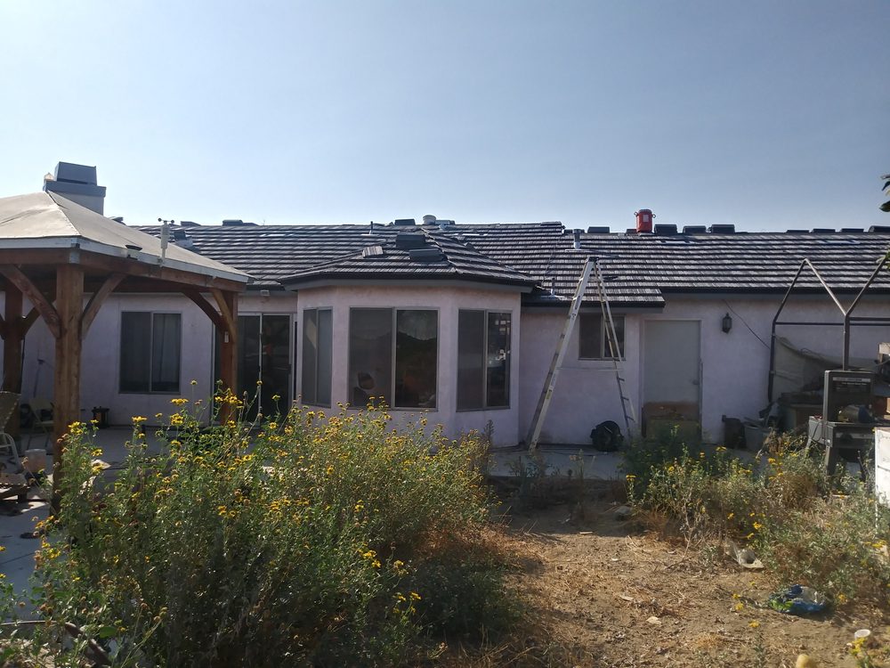 Slide of Ortiz Roofing and Construction Company