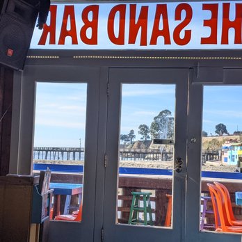 The Sand Bar - Looking out on to the beach at The Sand Bar - Cocktail Bars Near Me - Capitola, California The Sand Bar - Looking out on to the beach at The Sand Bar - Cocktail Bars Near Me - Capitola, California