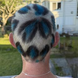 Rudy's Barbershop - Andreus D did such a great job on my husbands hair. He wanted cheetah - he got a custom design that Andreus even did homework for.