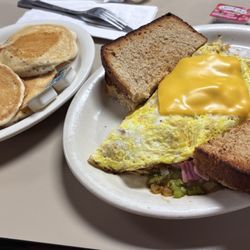 Sue's Kountry Kitchen - Denver Omelette, wheat toast and huge $ pancakes $13! Awesome deal & crammed with fillings