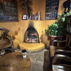 Taos Java - The cozy fireplace nook.