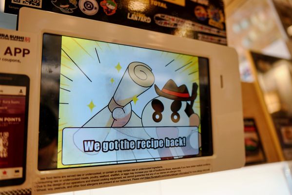 Kura Revolving Sushi Bar by null