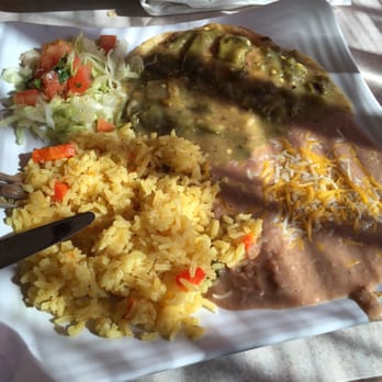 Irma's Kitchen - Huevos Rancheros with salad, beans, and rice. - Breakfast & Brunch Near Me - Phoenix, Arizona Irma's Kitchen - Huevos Rancheros with salad, beans, and rice. - Breakfast & Brunch Near Me - Phoenix, Arizona