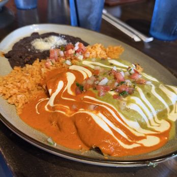 Que Onda Tacos University - Chicken enchiladas with half green and half red sauces - Mexican Near Me - Charlotte, North Carolina Que Onda Tacos University - Chicken enchiladas with half green and half red sauces - Mexican Near Me - Charlotte, North Carolina
