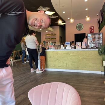The Boba Bar - a man standing in front of a pink chair - Bubble Tea Near Me - Omaha, Nebraska The Boba Bar - a man standing in front of a pink chair - Bubble Tea Near Me - Omaha, Nebraska