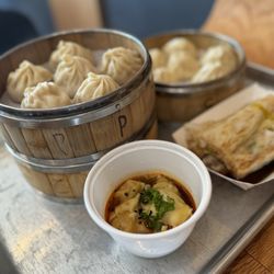 Tiger Soup Dumplings - Soup dumplings, spicy wontons, and the rice noddle dumpling.