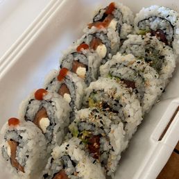 Happy Hour sushi: Salmon with creme cheese and spicy tuna with avocado Happy Hour sushi: Salmon with creme cheese and spicy tuna with avocado