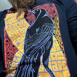 Grackle Skateboards - Latest graphic on a T-Shirt.