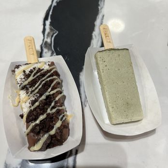 Zonkey Paletas - Cookies and cream paleta dipped in chocolate with sweetened condensed milk and Oreo crumble on top and matcha paleta plain - Ice Cream & Frozen Yogurt Near Me - San Diego, California Zonkey Paletas - Cookies and cream paleta dipped in chocolate with sweetened condensed milk and Oreo crumble on top and matcha paleta plain - Ice Cream & Frozen Yogurt Near Me - San Diego, California