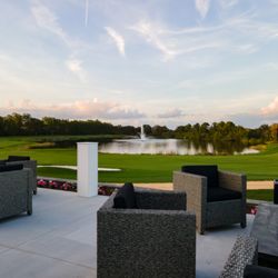 The Cape Club of Palm City - View of the lakeside finishing hole from the patio.