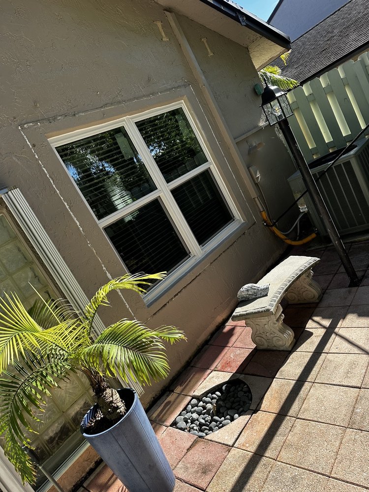 Slide of LockTight Impact Windows Doors & Roofing