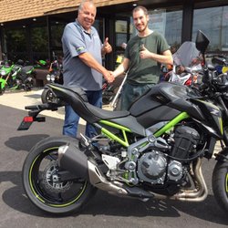 North Reading Motorsports - Our Kawasaki sales rep. Chip Dongara with a new customer
