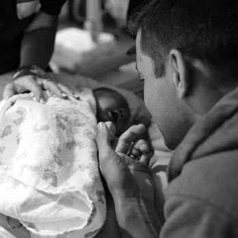 Heart Work Birth Services - Caren captured this sweet moment with our baby holding his Dad's hand for the first time. - Doulas Near Me Heart Work Birth Services - Caren captured this sweet moment with our baby holding his Dad's hand for the first time. - Doulas Near Me