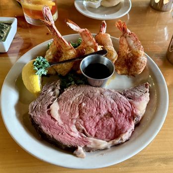 Ishnala - Prime Rib and 4 Broiled Prawns - served with Au Jus, Creamy Horseradish and Melted Butter - Steakhouses Near Me - Wisconsin Dells, Wisconsin