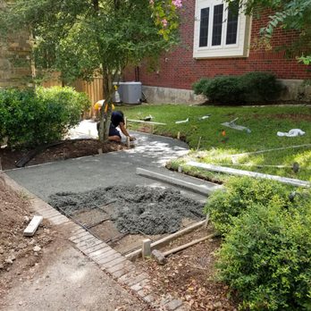 Dave's Concrete Construction - Filling the driveway extension. - Masonry/Concrete Near Me