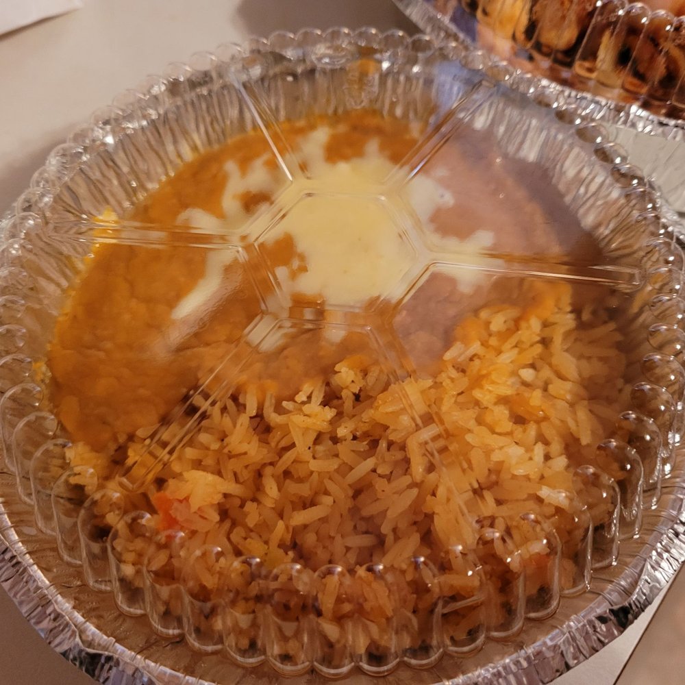 El Jinete - Side of rice and beans that accompanied my chicken fajitas. - Steakhouses Near Me - Cincinnati, Ohio El Jinete - Side of rice and beans that accompanied my chicken fajitas. - Steakhouses Near Me - Cincinnati, Ohio