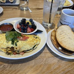 Mexican Omelette , Fruit, Sourdough Toast, and brewed Coffee.