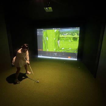 Golf Social - Momma getting her numbers with her new irons. - Virtual Reality Centers Near Me - La Quinta, California Golf Social - Momma getting her numbers with her new irons. - Virtual Reality Centers Near Me - La Quinta, California