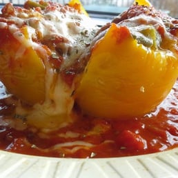 Delicious veggie stuffed yellow bell pepper topped with tomato sauce and lots of mozzarella cheese!