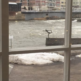 Pingala Cafe and Eatery - Chace Mill - View of the Winooski River and yoga sculpture from our window seat. - Vegan Near Me - Burlington, Vermont Pingala Cafe and Eatery - Chace Mill - View of the Winooski River and yoga sculpture from our window seat. - Vegan Near Me - Burlington, Vermont