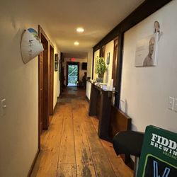 Omakase - Hallway with two bathrooms. Facing the exit/entrance. My back is to the host stand and seating.