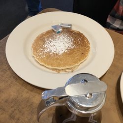 Mirror Lake Diner - Husband's pancake that I tasted. Really good! Powdered sugar was delightful!
