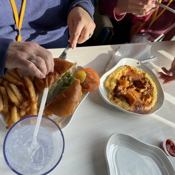 Wicked Tuna - (Left) Prime Ground Burger (Right) Shrimp and Grits - New American Near Me - Myrtle Beach, South Carolina
