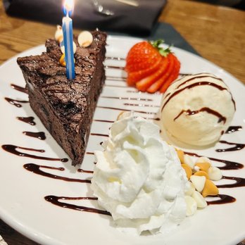 Moondance Grill - Chocolate Brownie with vanilla ice cream and fresh strawberries! - New American Near Me - Germantown, Tennessee