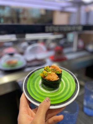 Kura Revolving Sushi Bar by null
