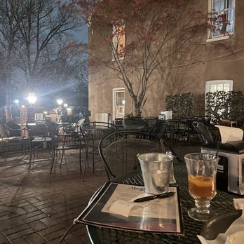 Magpie's Cafe - a view of a patio at night - New American Near Me - Saint Charles, Missouri Magpie's Cafe - a view of a patio at night - New American Near Me - Saint Charles, Missouri