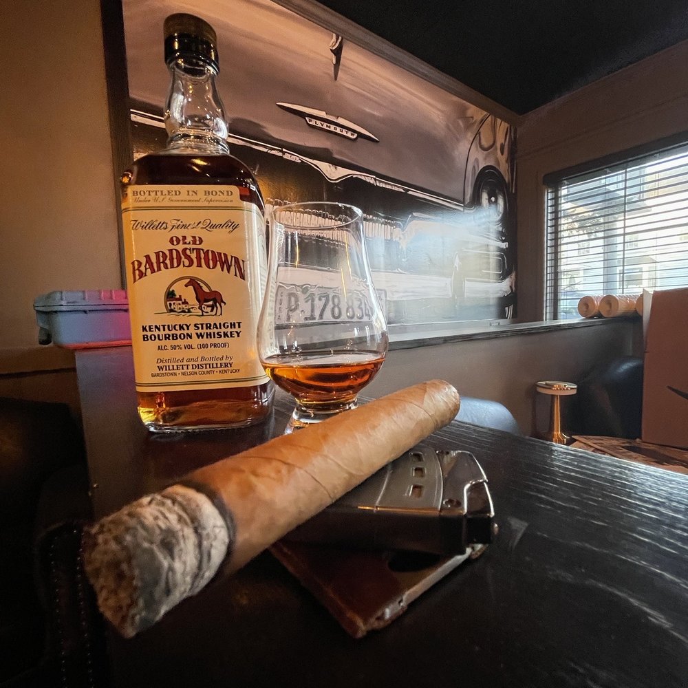 The Carmel Cigar Vault - a cigar and a bottle of bourbon - Cigar Bars Near Me - Carmel, New York The Carmel Cigar Vault - a cigar and a bottle of bourbon - Cigar Bars Near Me - Carmel, New York