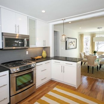 Haycon - a kitchen with white cabinets and stainless steel appliances - General Contractors Near Me - Boston, Massachusetts Haycon - a kitchen with white cabinets and stainless steel appliances - General Contractors Near Me - Boston, Massachusetts