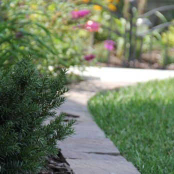 RJ Lawn & Landscape - a garden with flowers and shrubs - Landscaping Near Me - Waukee, Iowa RJ Lawn & Landscape - a garden with flowers and shrubs - Landscaping Near Me - Waukee, Iowa