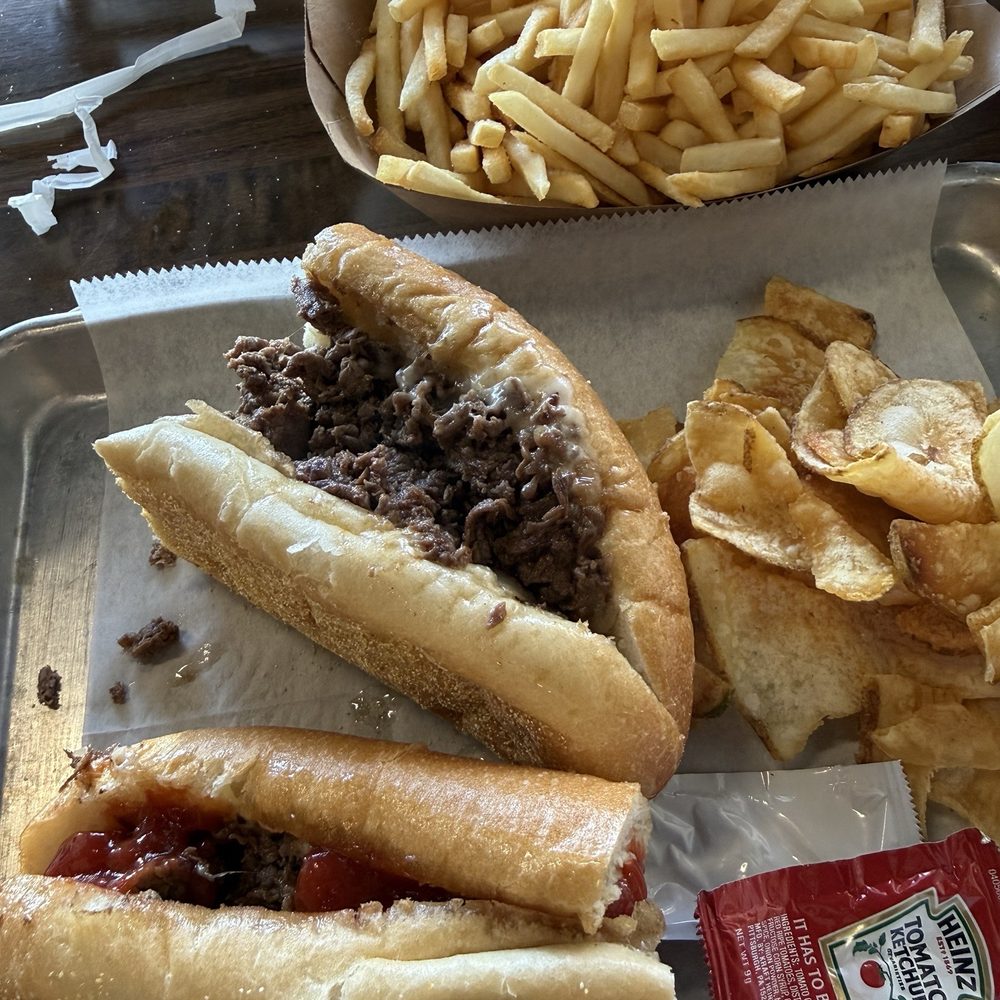 Cheesesteak, chips and fries