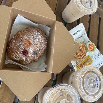 Raccoon Coffee - Iced Vanilla Latte, Empanada, and Guava Croissant - Coffee & Tea Near Me - Miami, Florida Raccoon Coffee - Iced Vanilla Latte, Empanada, and Guava Croissant - Coffee & Tea Near Me - Miami, Florida