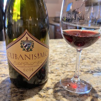 Cubanisimo Vineyards - a glass of wine and a bottle of wine - Wineries Near Me - Salem, Oregon