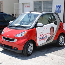 Sign One, Inc - Car wrap for Sherry.