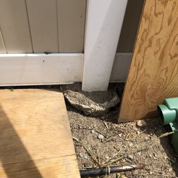 Roley's Tree Care - a wood board and a green hose - Tree Services Near Me - Langley, Oklahoma