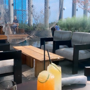 Electric Lemon - Drinks: one alcoholic and one non-alcoholic - New American Near Me - New York, New York Electric Lemon - Drinks: one alcoholic and one non-alcoholic - New American Near Me - New York, New York