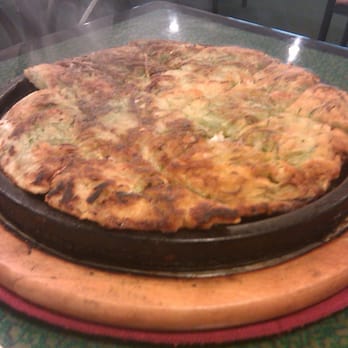 Young's Korean Restaurant - HaeMul-PaJun - Crispy Korean style pancake with seafood & vegetables - $14.95 - Korean Near Me - Rochester, New York Young's Korean Restaurant - HaeMul-PaJun - Crispy Korean style pancake with seafood & vegetables - $14.95 - Korean Near Me - Rochester, New York